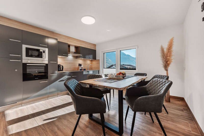 Kitchenette and dining table in holiday apartment Top 3