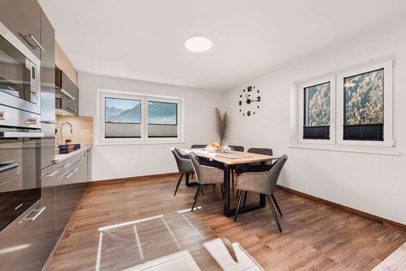 Kitchenette with dining table and chairs in the second floor